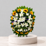 Corona de girasoles y lirios